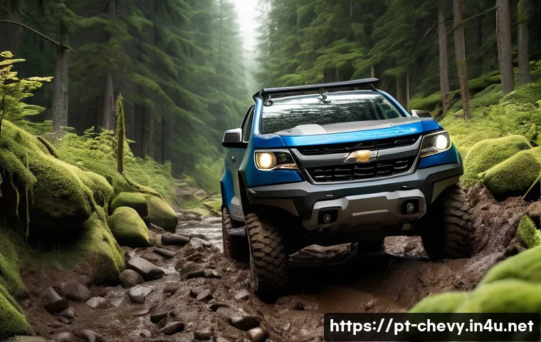 쉐보레 콜로라도의 오프로드 패키지 - A rugged Chevrolet Colorado pickup truck equipped with an off-road package, driving through a challe...